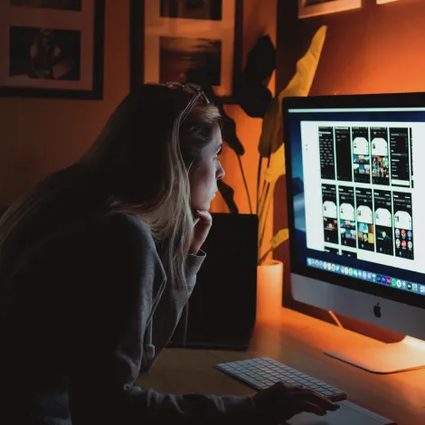 Image of a Person Working on an iMac